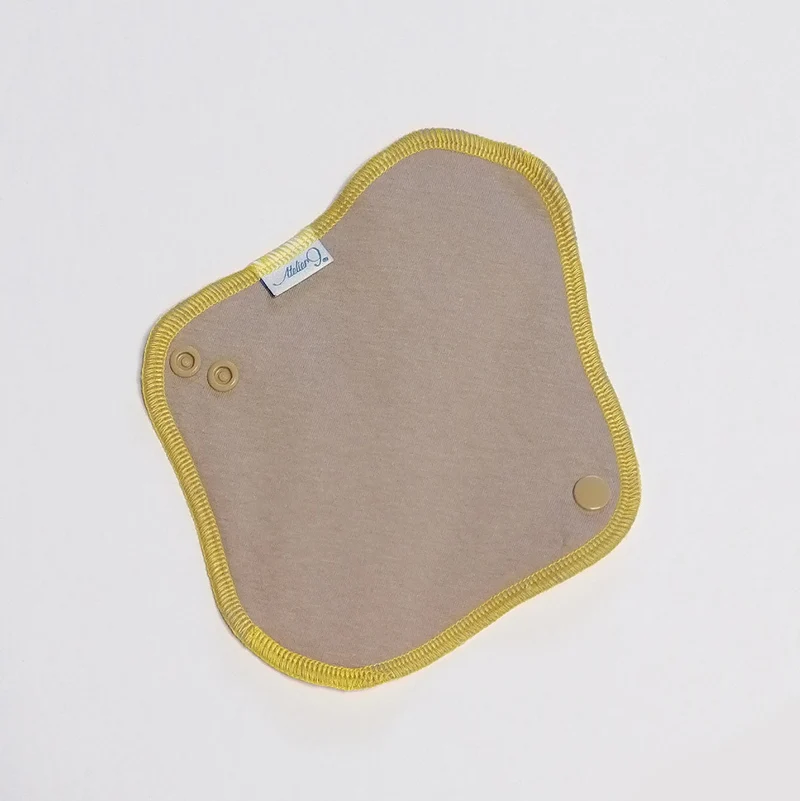 Protection périodique - Taupe fil jaune