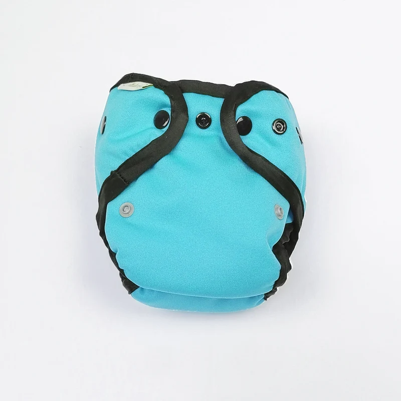 Couche naissance: enveloppe + insert